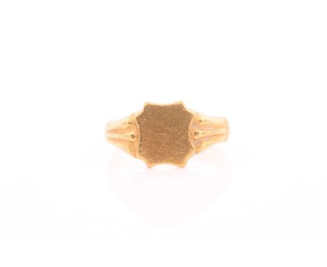 A yellow metal signet ring, with shield-shaped vacant cartouche, unmarked, size M 1/2.Condition report: 5.6 grams