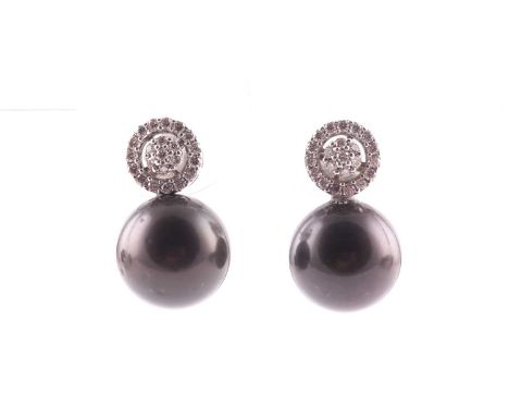 A pair of Tahitian pearl and diamond earrings, each with a diamond cluster, approximate diameter 8 mm, above a black pearl me