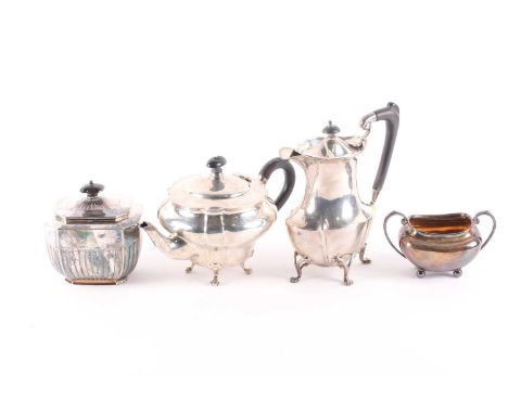 A 20th century matched three-piece silver tea set including a Sheffield 1907 sucrier, the other silver items marks are rubbed