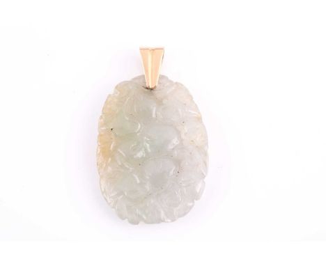 A Chinese jade pendant, the oval plaque with ornately pierced and carved decoration, depicting leaves and fruit, measuring ap