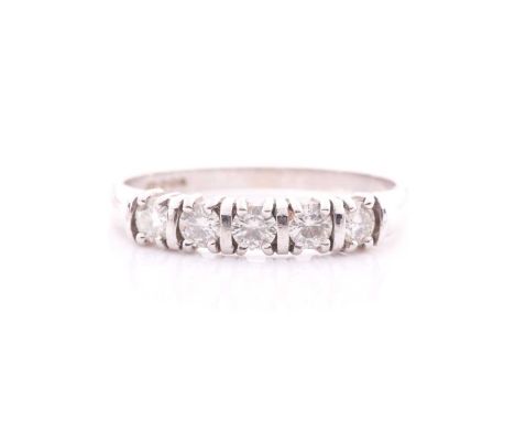 A diamond half hoop eternity ring; comprising five round brilliant cut diamonds in claw mounts with bar spacers on a plain 9 