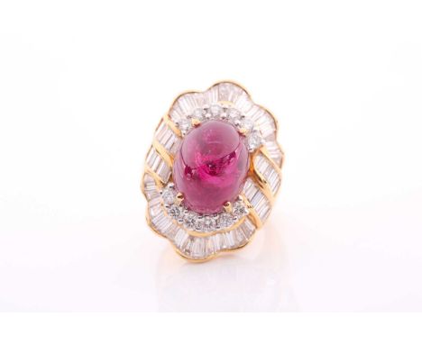 A yellow metal, diamond, and ruby cocktail ring, the ballerina mount set with round and tapered baguette-cut diamonds, centre