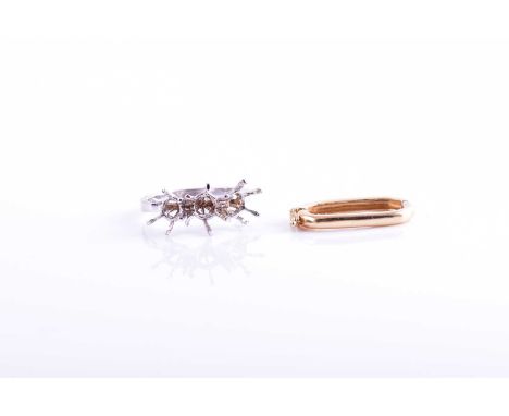 A white metal ring mount, unmarked, size L 1/2, together with a yellow metal clasp link. (2)Condition report: 7 grams combine