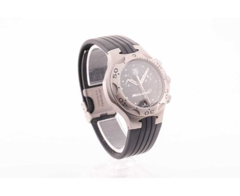 A Tag Heuer McLaren Kirium Ti5 Limited Edition chronograph wristwatch, the carbon fibre dial with twin subsidiary dials, date