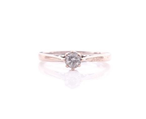 A single stone diamond ring, the round brilliant cut diamond in eight claw mount to a plain 18 carat white gold shank; Diamon