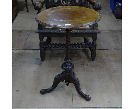 A Victorian walnut circular topped wine table on tripod base, 51cm x 72cm