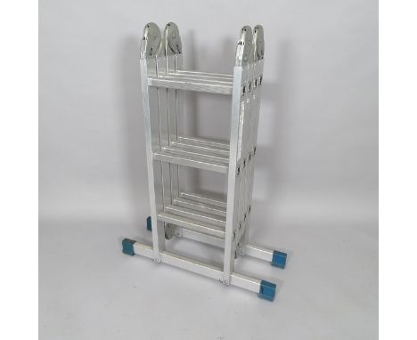 A folding metal ladder, dimensions (folded) 75cm x 100cm x 28cm 