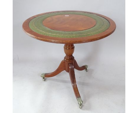 A reproduction mahogany circular-top occasional table, on tripod base, 52cm x 49cm 
