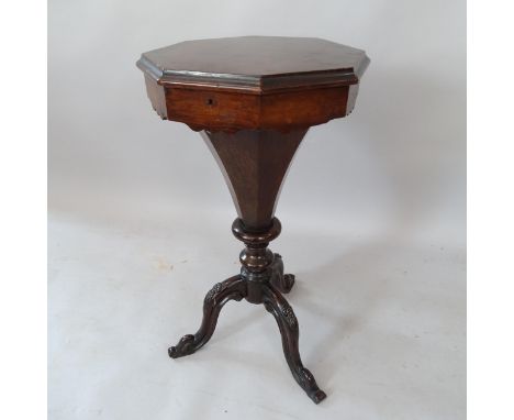A Regency rosewood octagonal work table, with fitted interior, on tripod base, 42cm x 78cm 