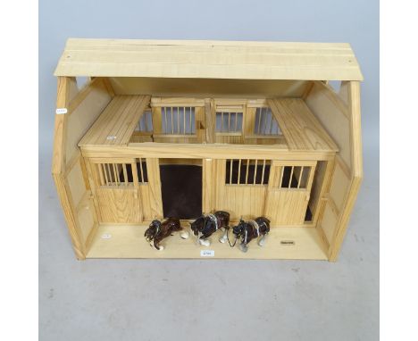 A handmade miniature horse's stable, with label for Breyer, and 3 ceramic horse figures, 74cm x 55cm x 55cm 