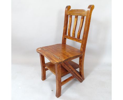 A reproduction metamorphic library step chair 