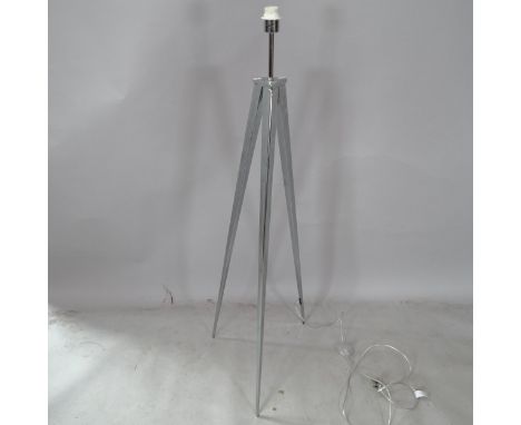 A contemporary chrome rocket standard lamp, on tripod base, H144cm 
