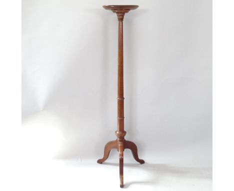 A reproduction mahogany torchere on tripod base, 143cm 