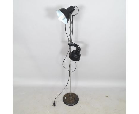 A mid-century floor lamp, with 2 adjustable lights 
