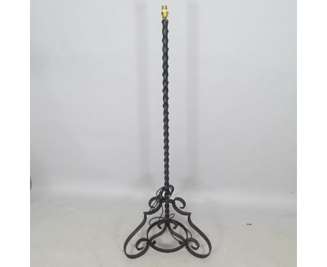 A wrought-iron standard lamp, height to bayonet 150cm 
