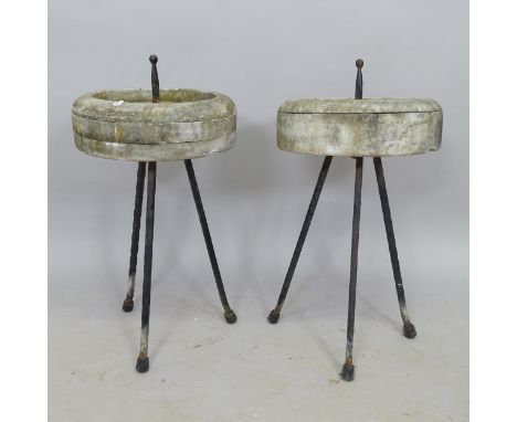 A pair of marble bird baths, on tripod base, 30cm x 60cm 