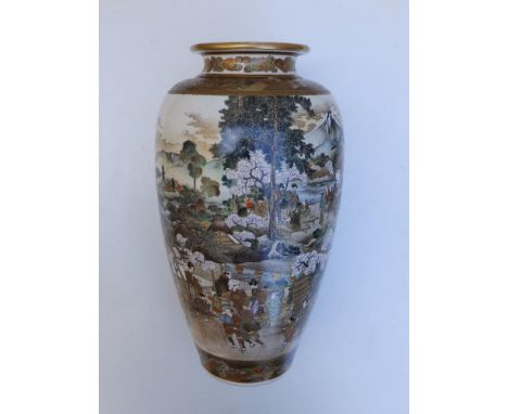 A  signed  Japanese Meiji period Satsuma earthenware vase by Okamoto Ryozan, Yasuda Company, the main panel to front painted 