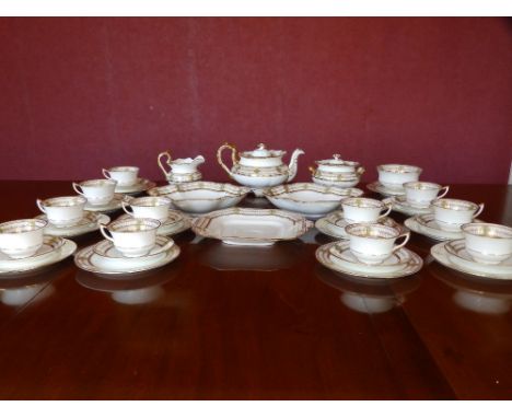 42 pieces of gilt decorated Aynsley tea china, comprising; teapot, covered sugar bowl, cream jug, slop bowl, bread &amp; butt