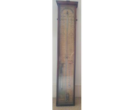 An Admiral Fitzroy barometer in glazed wooden case. 37.5" high.