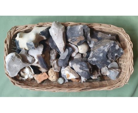 A collection of prehistoric flint tools, some with inscriptions stating some found at Windmill Hill.
