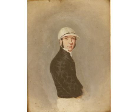 Late 19th/early 20thC School - oil on board - Half length portrait of a  jockey in black with white cap, 9.5" x 7".