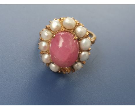 A cabochon ruby &amp; pearl oval cluster ring - a/f.