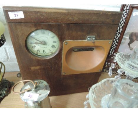 A vintage clocking in clock by Gledhill Brook, Time Recorders, Huddersfield