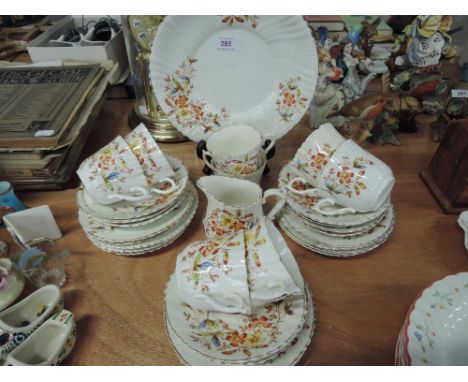 A vintage fluted part tea service in autumnal colouring (34 pieces approx)