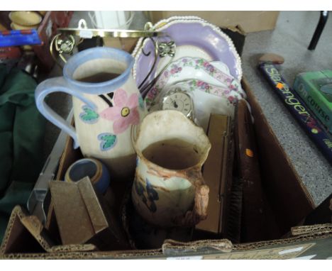 A box containing a miscellaneous selection including Woods vase, carriage clock etc