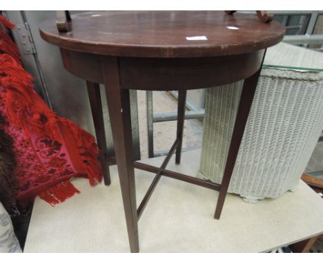 A vintage stained frame circular occasional table