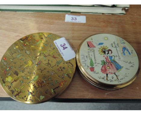 Two vintage compacts including one by Vogue