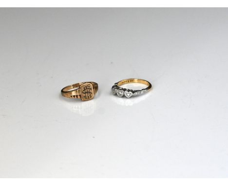 9ct gold signet ring 2.18g size M, and an 18ct gold and platinum diamond ring set in three heart shaped surrounds, 2.13g size