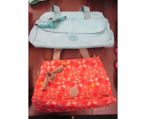 2 Kipling hand bags light blue/green and pink multi medium size