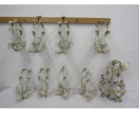 A ceiling light and matching wall lights