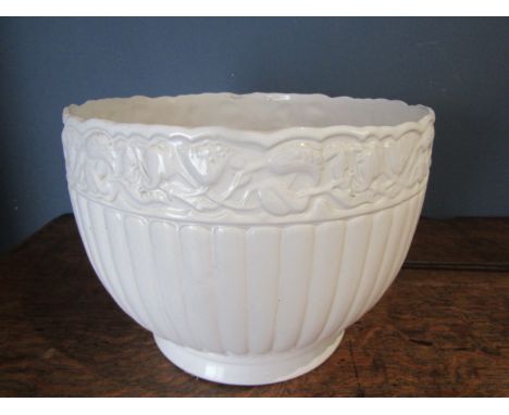A white ceramic planter 25cmH 34cm Dia  