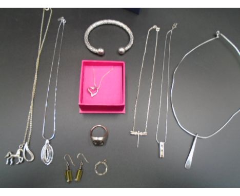 A collection of silver (925) jewellery items - to include a boxed bangle, necklaces, earings etc..