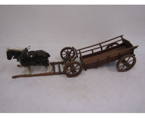 A hand made horse wagon with a ceramic horse cart 40cm long