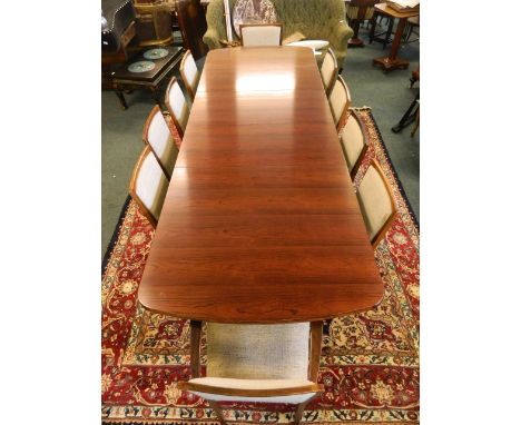 A Gordon Russell R.152 'Marlow' rosewood extending dining table with two extra leaves, and a set of ten (8 and 2) Gordon Russ