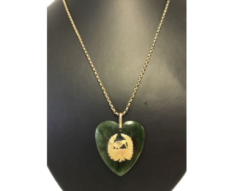 Antique New Zealand Pounamu nephrite jade & gold heart shaped pendant. Decorated with 9ct gold Kiwi design.  On a vintage 20"