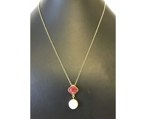A silver gilt necklace and pendant, set with ruby and freshwater pearl.  With 18"extendable chain.