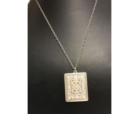 A heavy 925 silver ingot with Celtic knot designs to front & back on silver chain. Engraved to bottom edge 'St. Valentine's D