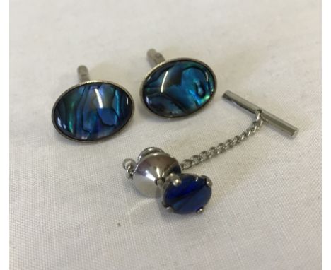 Silver cufflinks with blue enamelled decoration and matching tie pin. Back to tie pin not silver. 