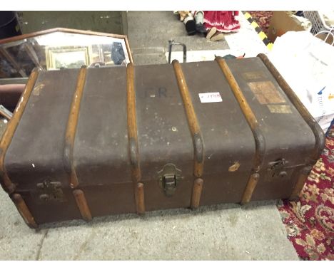 A timber and brass bound cabin trunk.