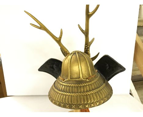 A Samurai helmet with antlers.