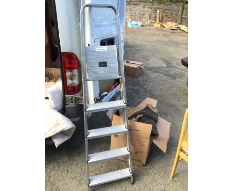 A pair of aluminium step ladders.