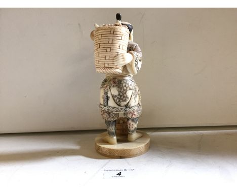 A bone Japanese figure of a fisherman carrying baskets with damage approx 190 mm 