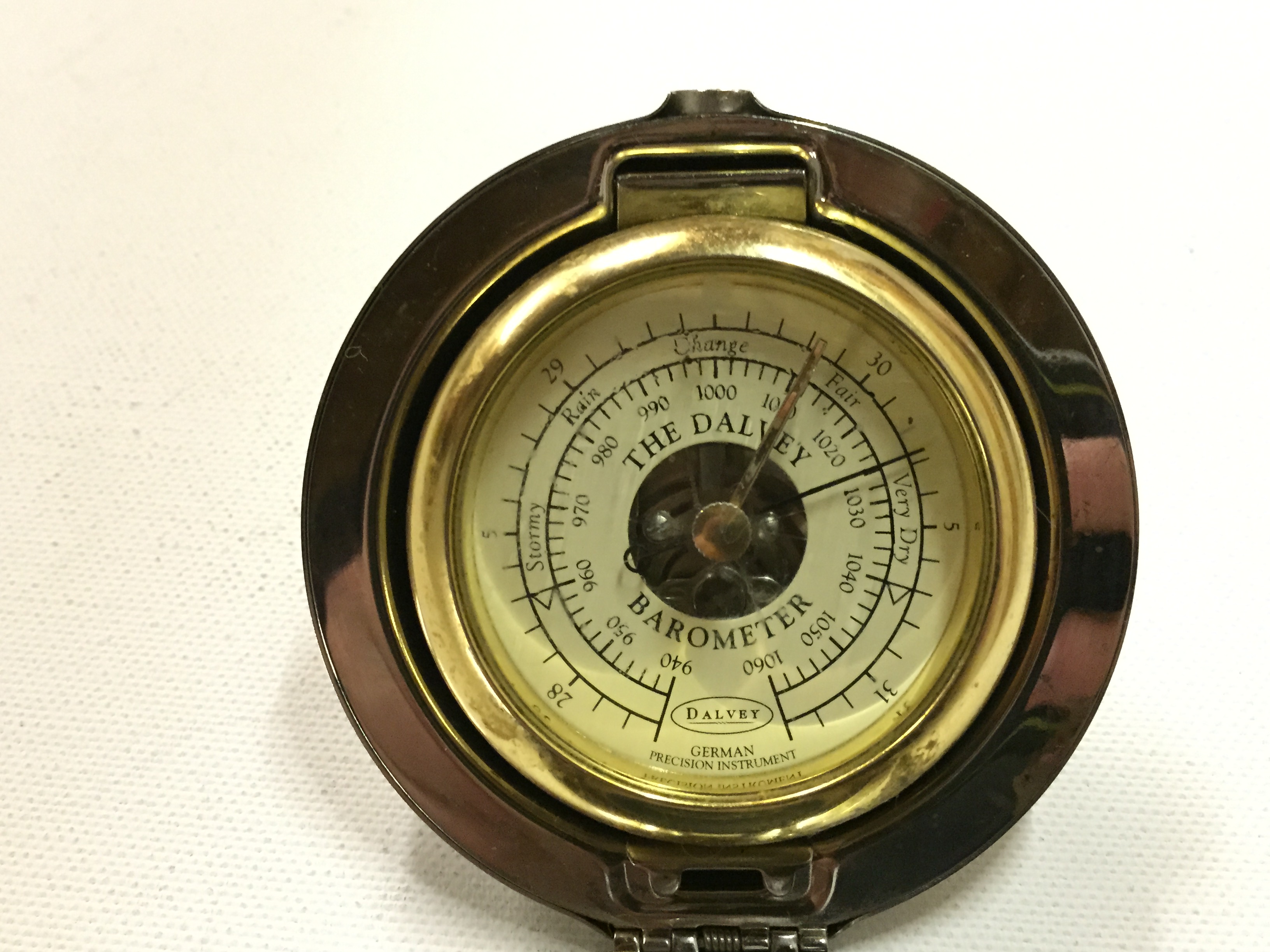 A Dalvey pocket barometer.