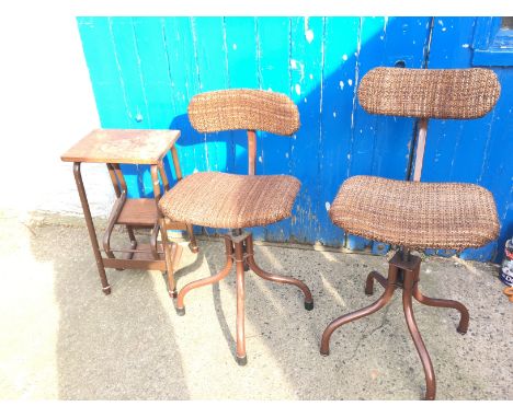 Two Tan-sad adjustable office chairs and a step stool.