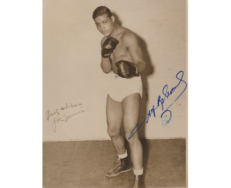 LOUIS JOE: (1914-1981) American Boxer, World Heavyweight Champion 1937-49. Vintage signed sepia 7 x 9 photograph of Louis sta