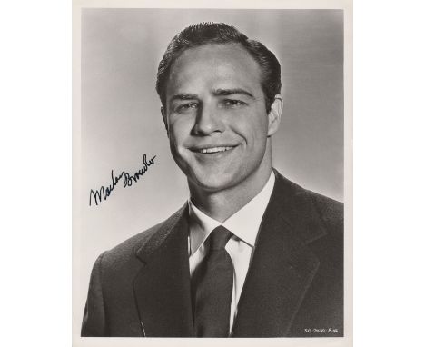 BRANDO MARLON: (1924-2004) American Actor, Academy Award winner. Vintage signed 8 x 10 photograph of Brando in a smiling head